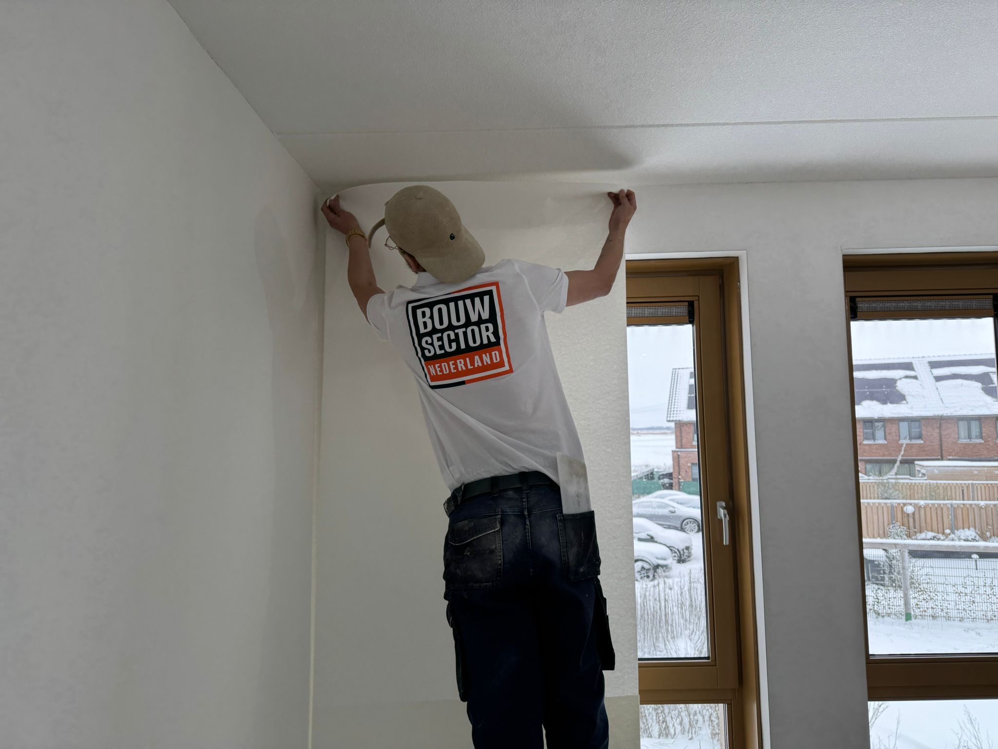 Renovlies wordt aangebracht door de behanger van Bouwsector Nederland.